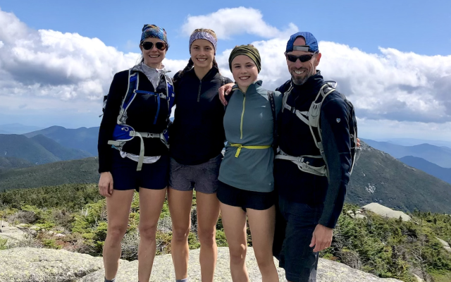 Dr. Rob Campbell and his family hiking