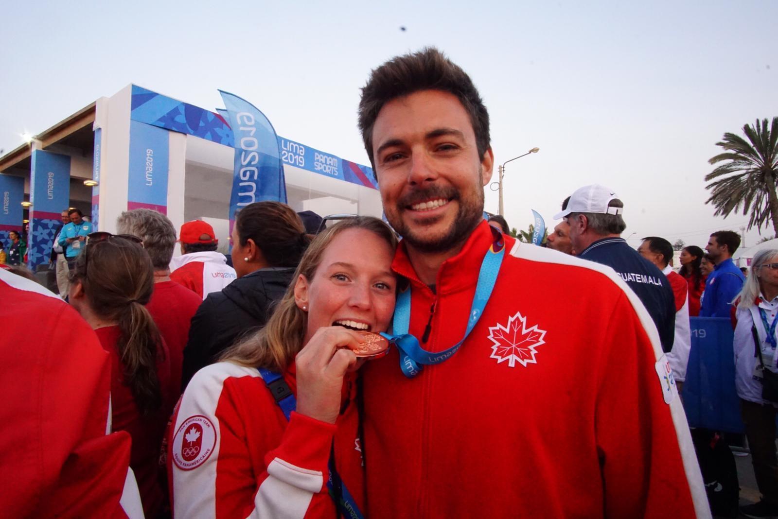 Ali and Justin with their medals
