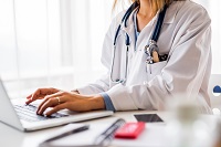 physician using a computer