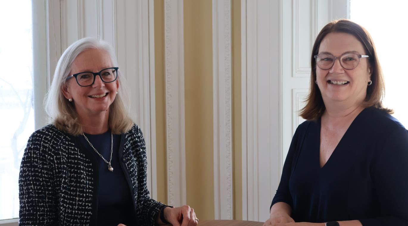 photo of Drs. Jane Philpott and Diane Lougheed smiling at the camera