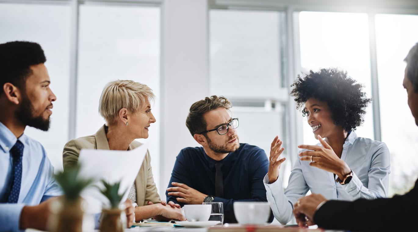 group of people working at a table