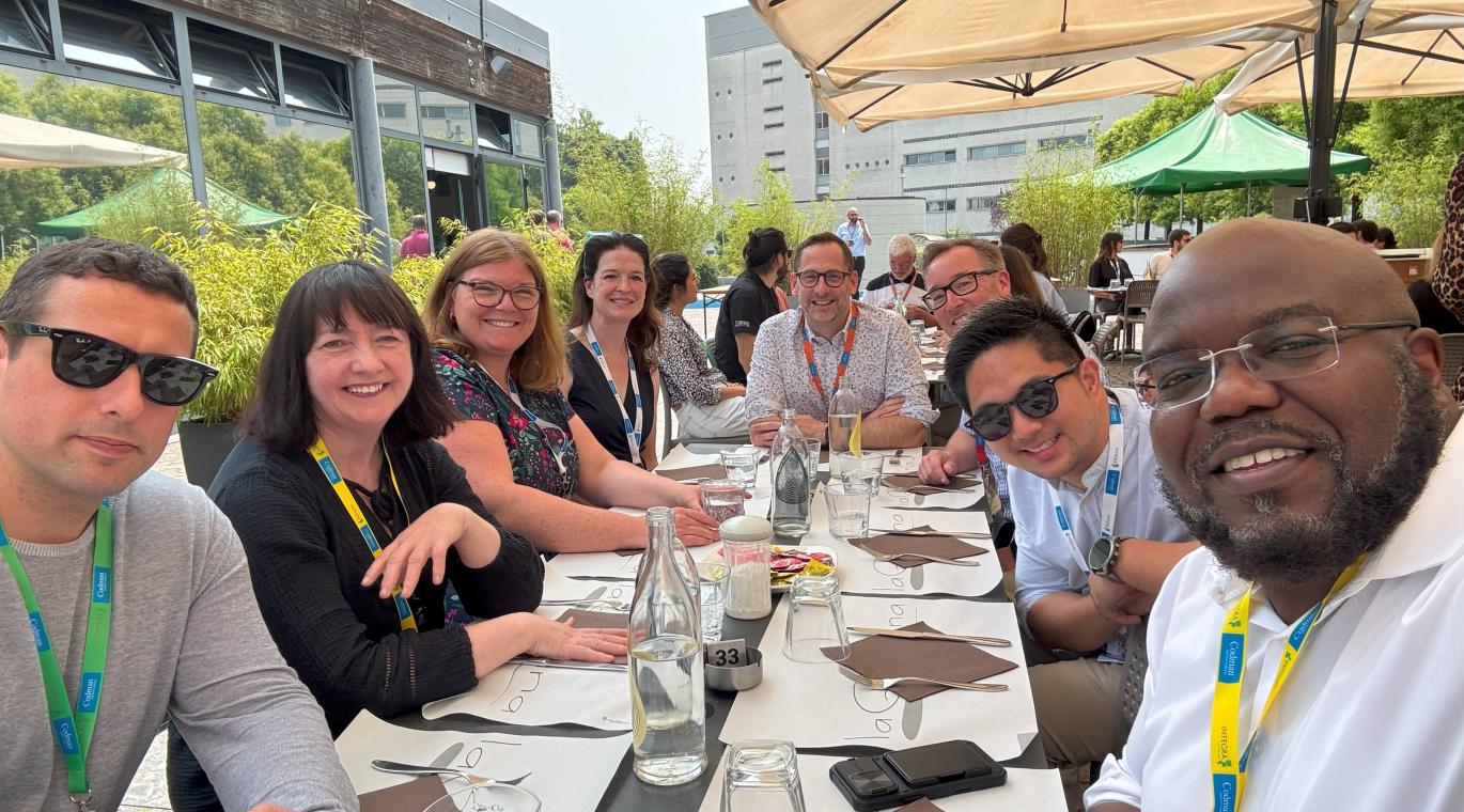 Summer Program Attendees at table for lunch