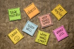 Tack board with post it notes of wellbeing words